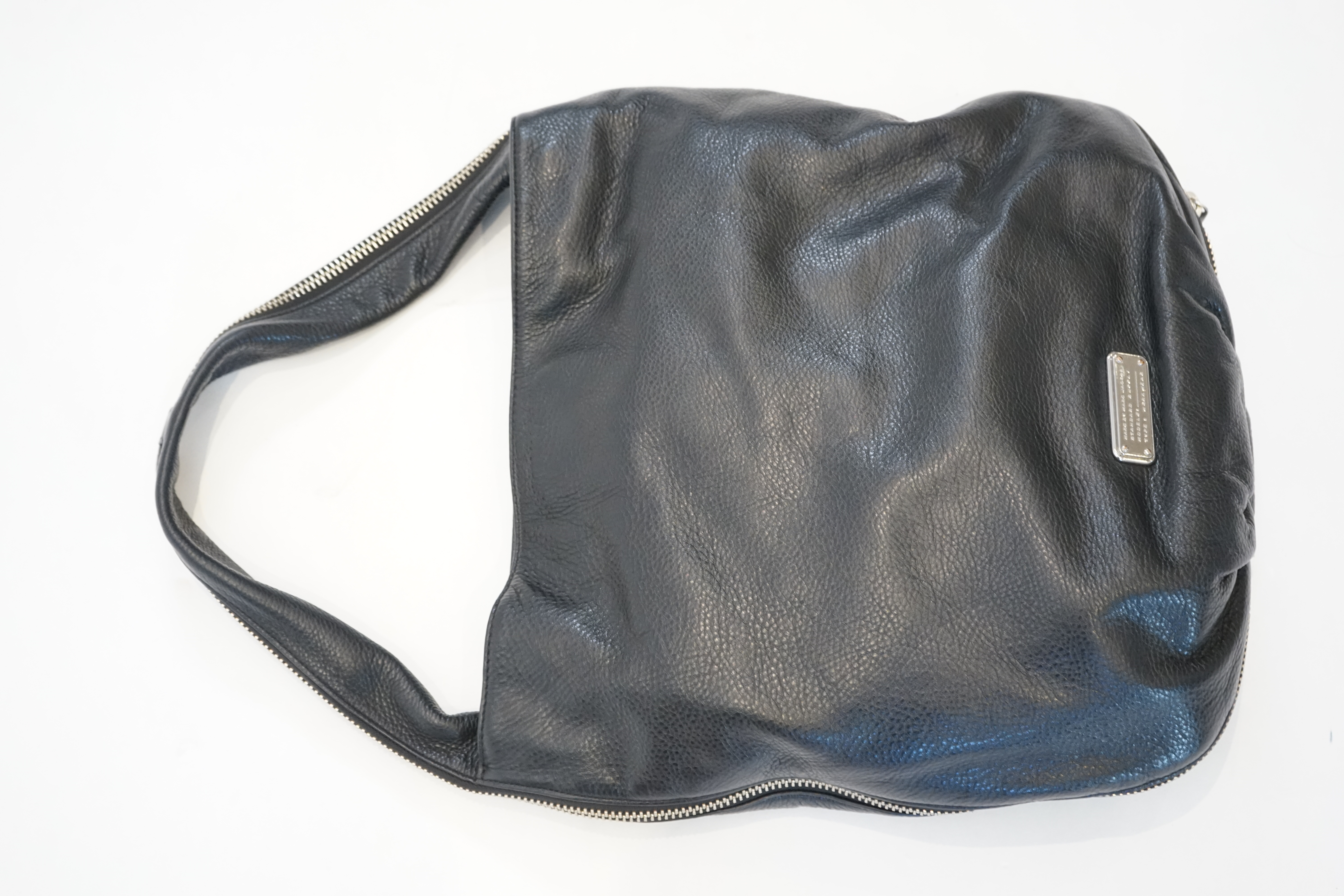 A Marc Jacobs black leather boho with silver zip detail, width 40cm, depth 15cm, height 35cm